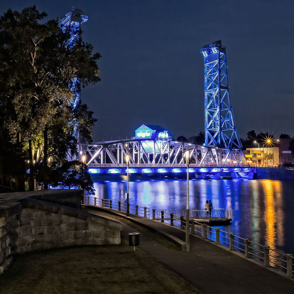 image of bridge 13 at night glowing blue